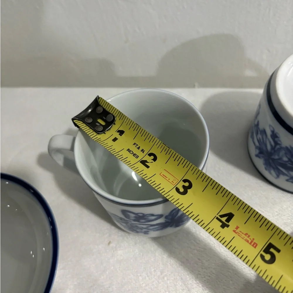 Williams Sonoma blue and white butterfly mugs and saucers